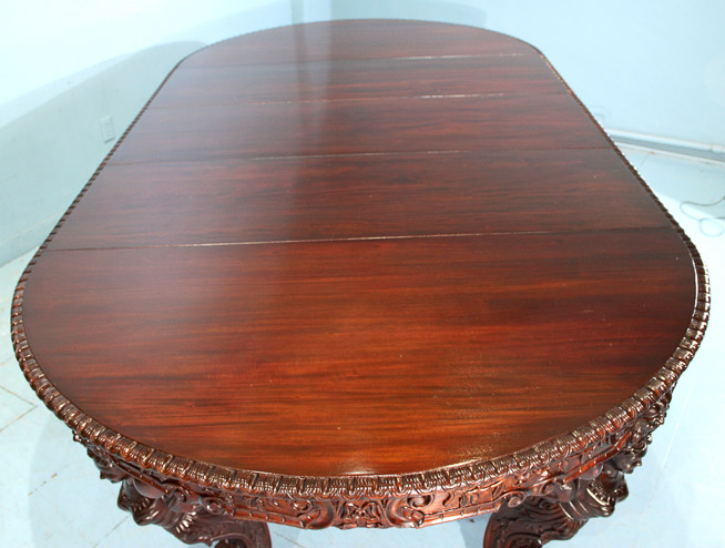 080m - Magnificent heavily carved 60 in. dining table