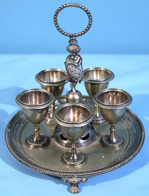 241a - Figural silver-plate egg stand, 8 in. T.