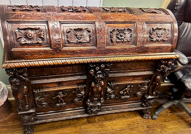 79a - English heavily carved oak roll top desk